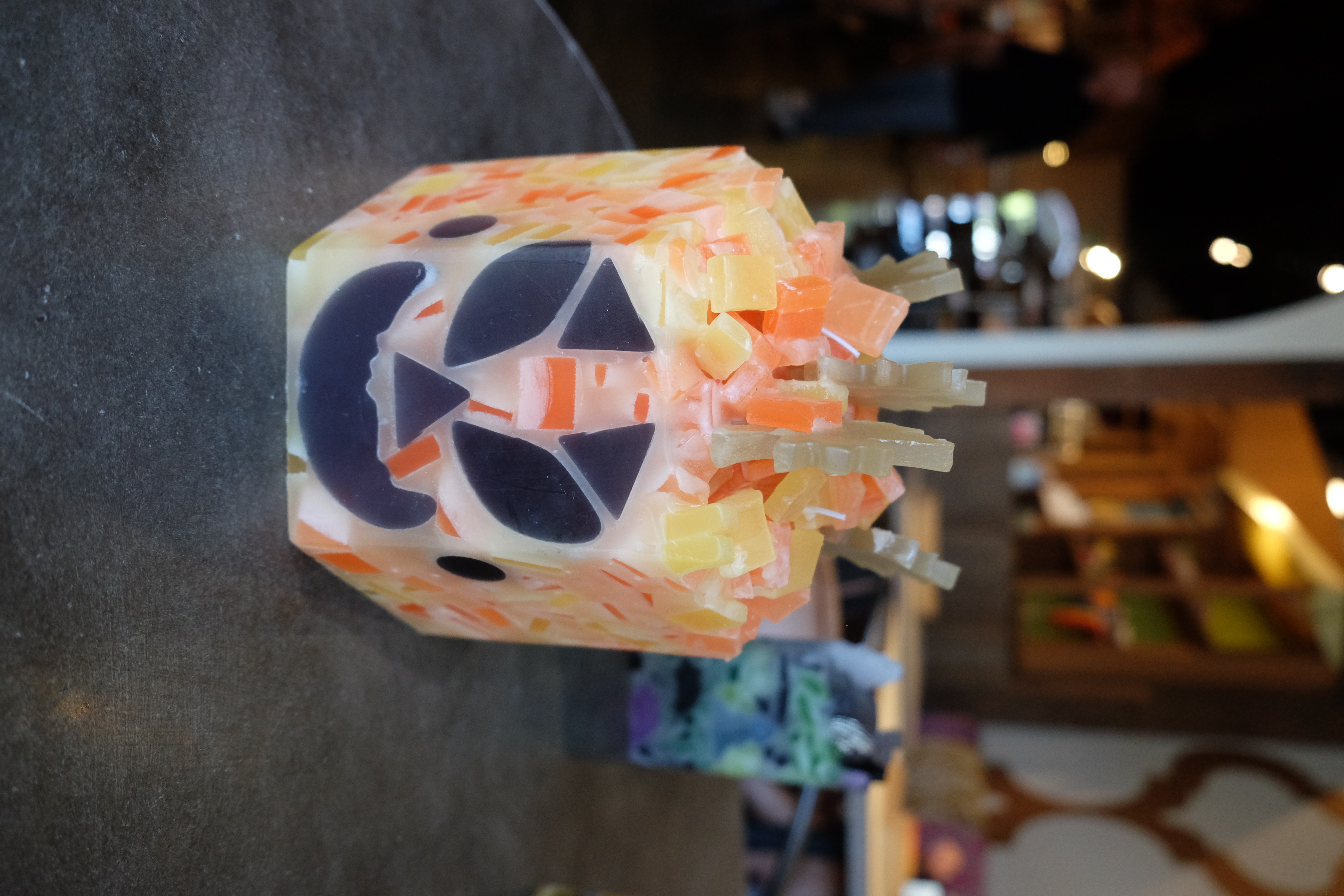 Halloween jack-o-lantern candle made at Glow Candle Lounge
