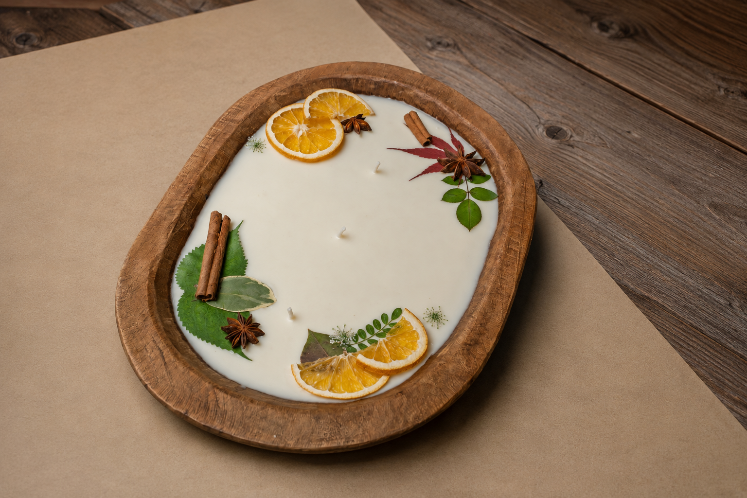 Botanical container candle with orange slices and cinnamon made at Glow Candle Lounge