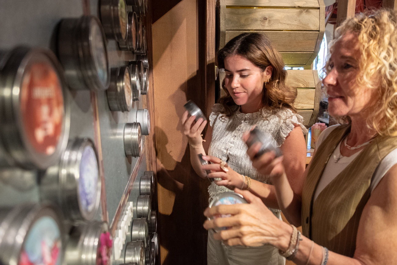 Guests browsing fragrance options at Glow Candle Lounge