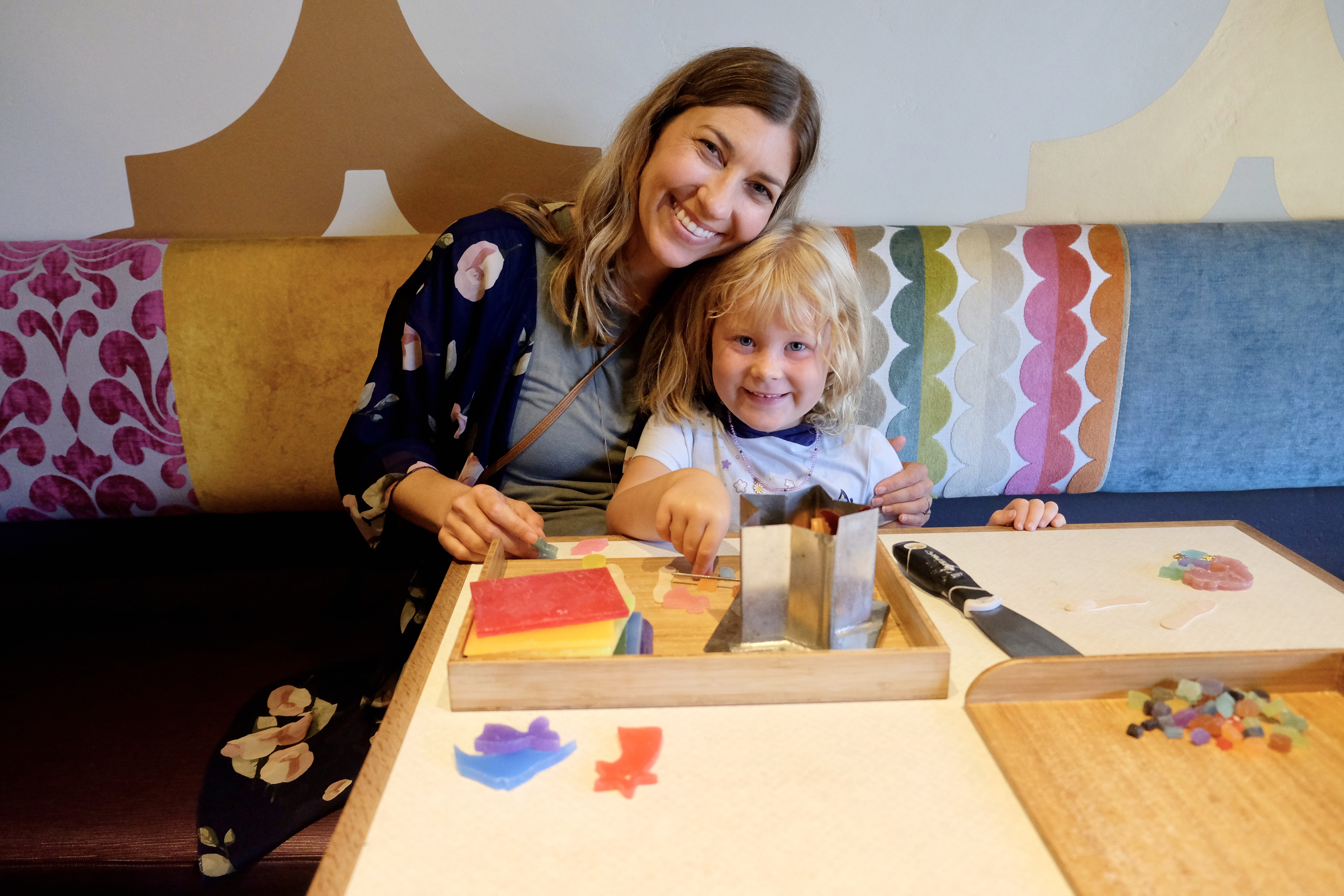 Family making candles together at Glow Candle Lounge