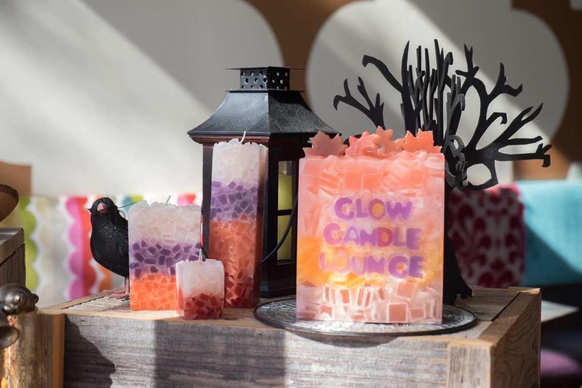Glow Candle Lounge branded candle display