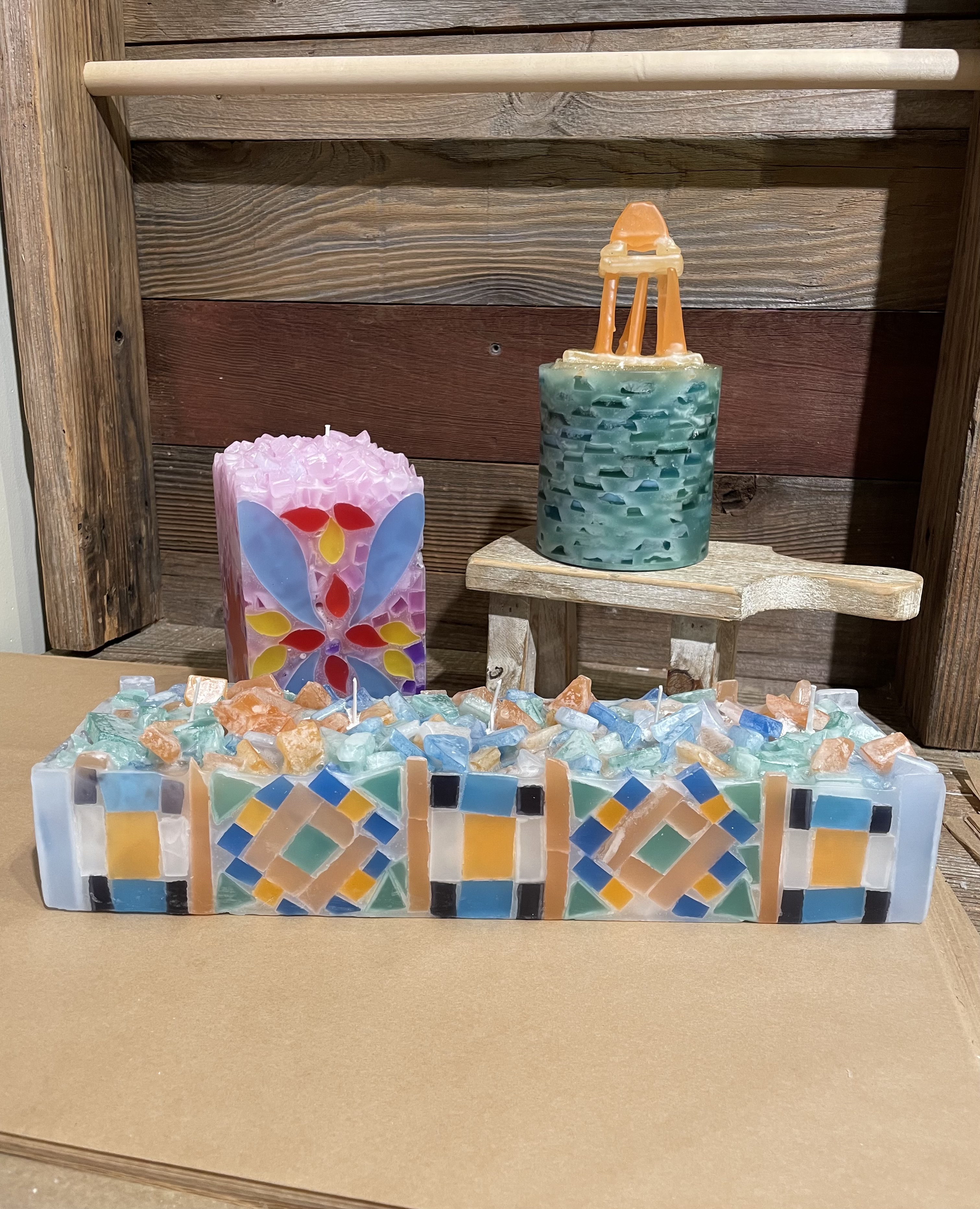 Collection of beautifully finished candles made at Glow Candle Lounge