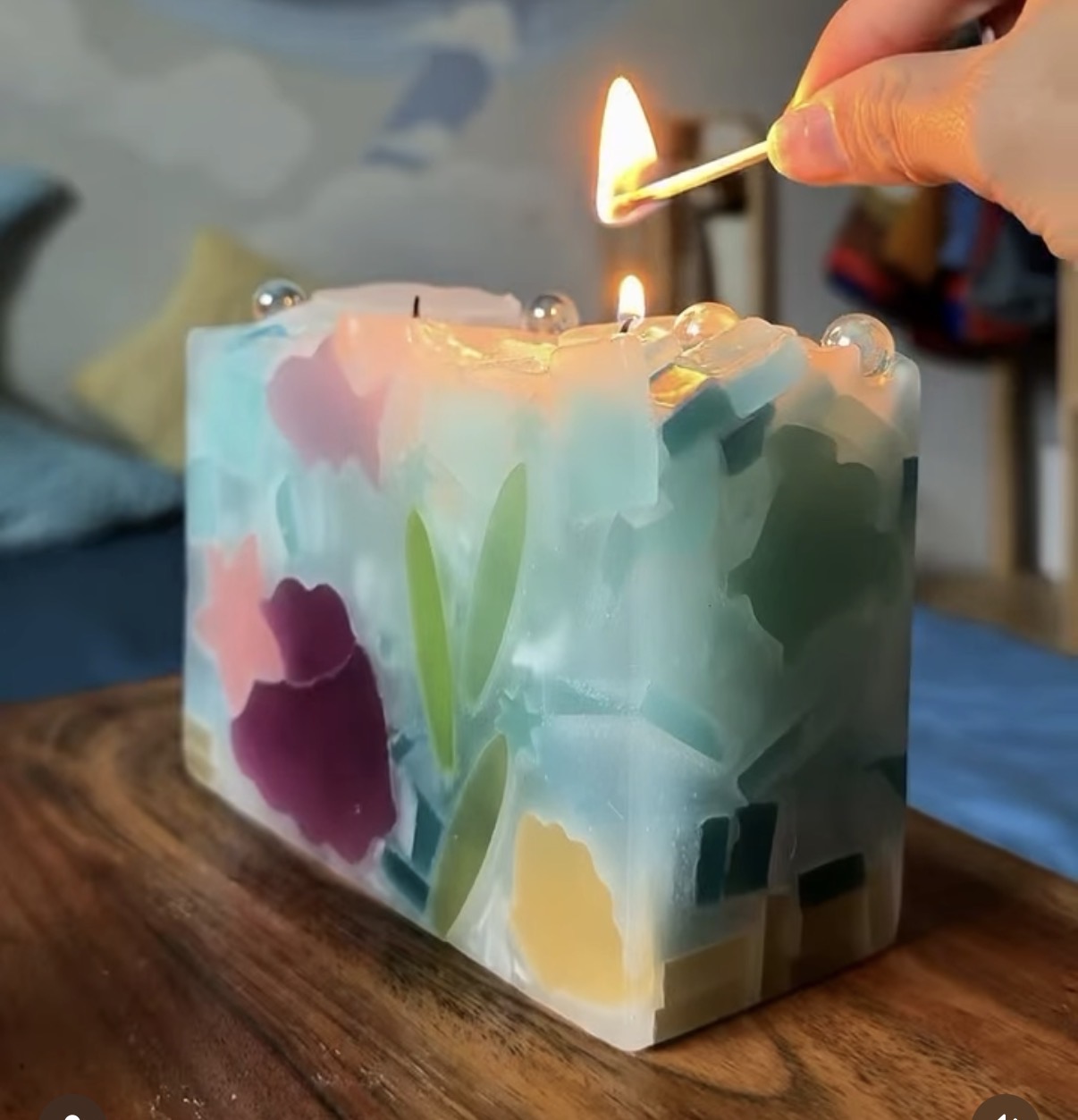 Handmade candle being lit for the first time at Glow Candle Lounge